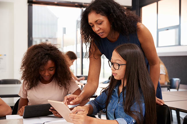 Teacher with students