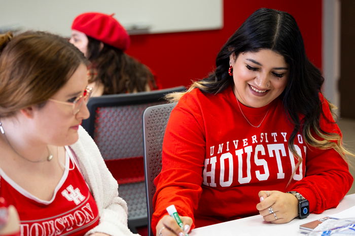 Two woman in a college classroom