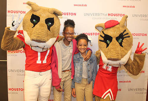 Shasta and Sasha stopped by the College of Education to pose with local elementary school students visiting campus Tuesday.