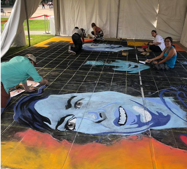 Students working on the “Hispanic Heritage” mural