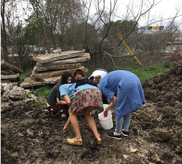 Students sourcing the clay on site.