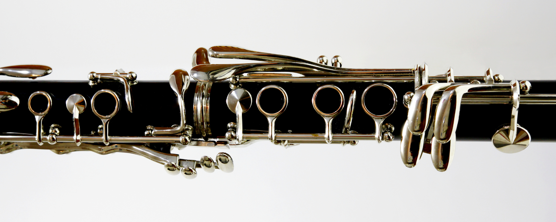 a clarinet in front of a white background