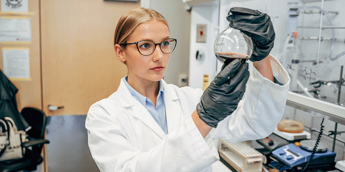 Photo of Ph.D. student in laboratory